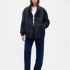 Oversized bomberjacka med stickad kant