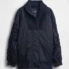 Oversized bomberjacka med stickad kant