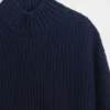 Oversized miniklänning i tröjstil med hög hals