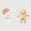 Paket med babydocka och kaka