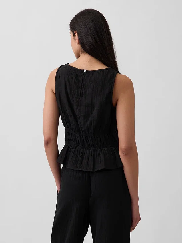 Peplum-top i bomullsgasväv med smockad midja