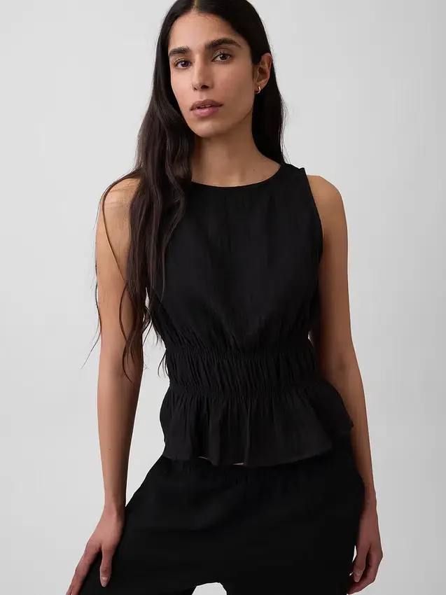 Peplum-top i bomullsgasväv med smockad midja