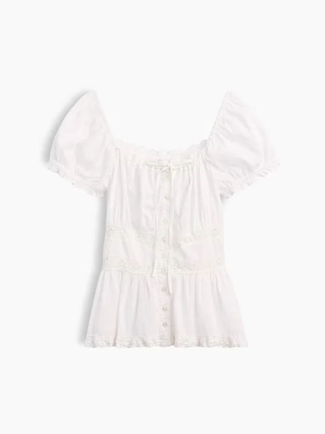 Peplum-top med fyrkantig halsringning och spetskant