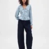 Peplum-top med krage och V-ringning