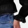Peplum-top med krage och V-ringning