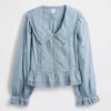 Peplum-top med krage och V-ringning