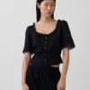 Peplum-top med spetskant