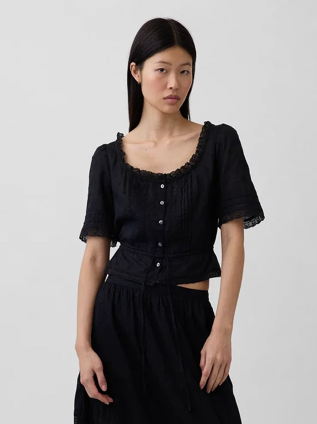 Peplum-top med spetskant