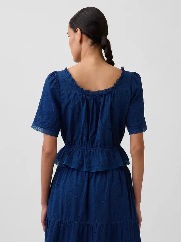 Peplum-top med spetskant