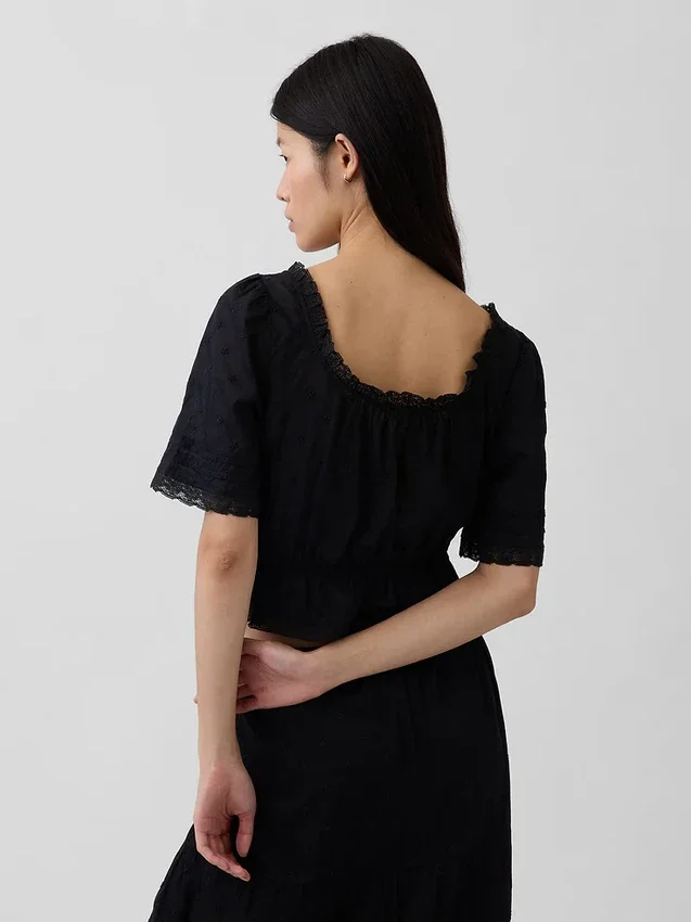 Peplum-top med spetskant