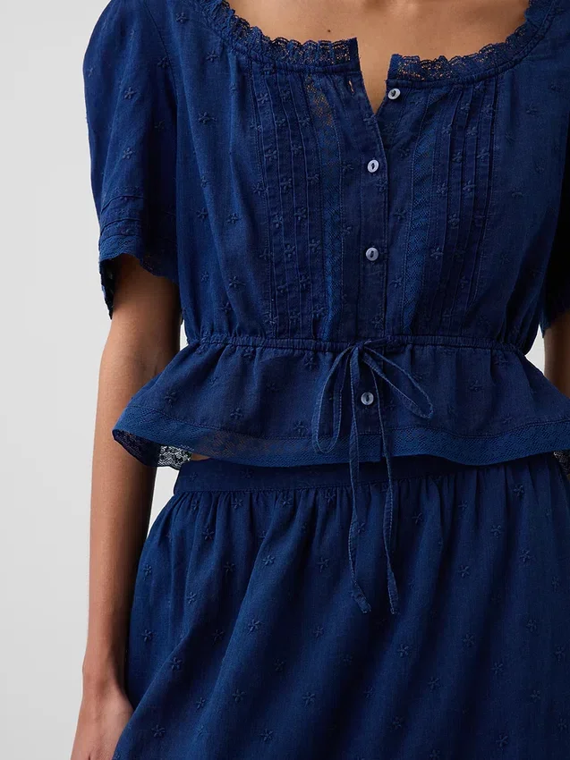 Peplum-top med spetskant