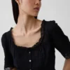 Peplum-top med spetskant