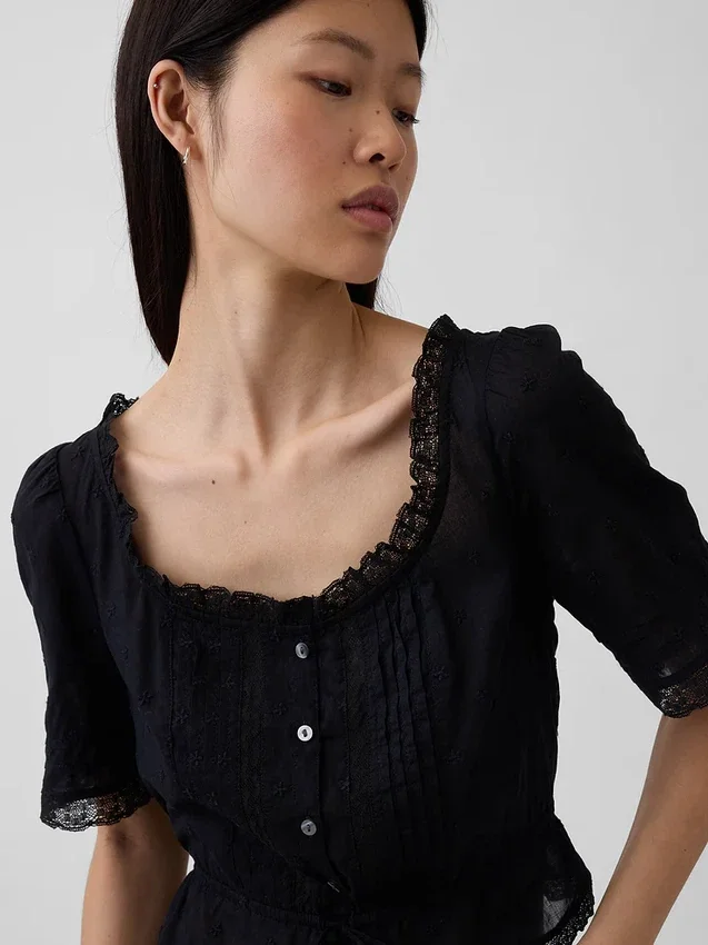 Peplum-top med spetskant