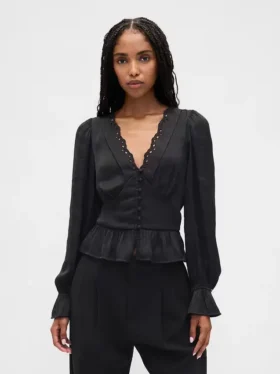 Peplum-top med V-ringning och hålbroderi