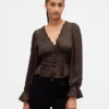 Peplum-top med V-ringning och hålbroderi