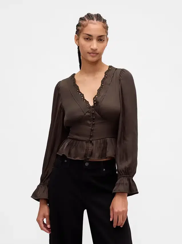 Peplum-top med V-ringning och hålbroderi