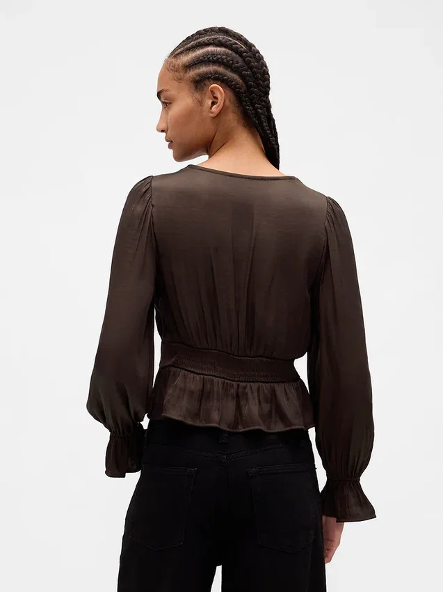 Peplum-top med V-ringning och hålbroderi