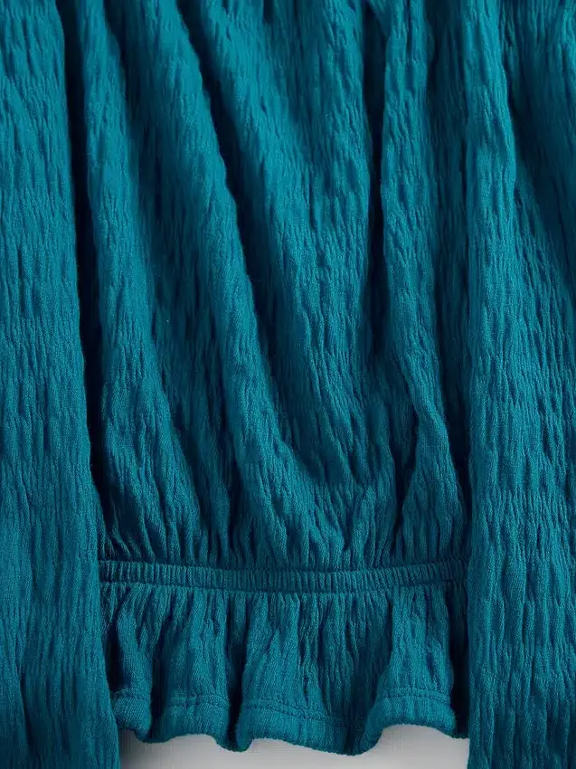Peplum-toppar i krusad tröja för barn