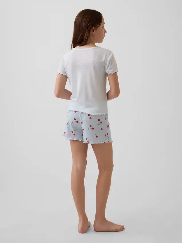 Pyjamas-set för barn i återvunnen ribbstickad tröja och shorts
