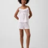 Pyjamas-set för barn i återvunnet material med volangtop och shorts