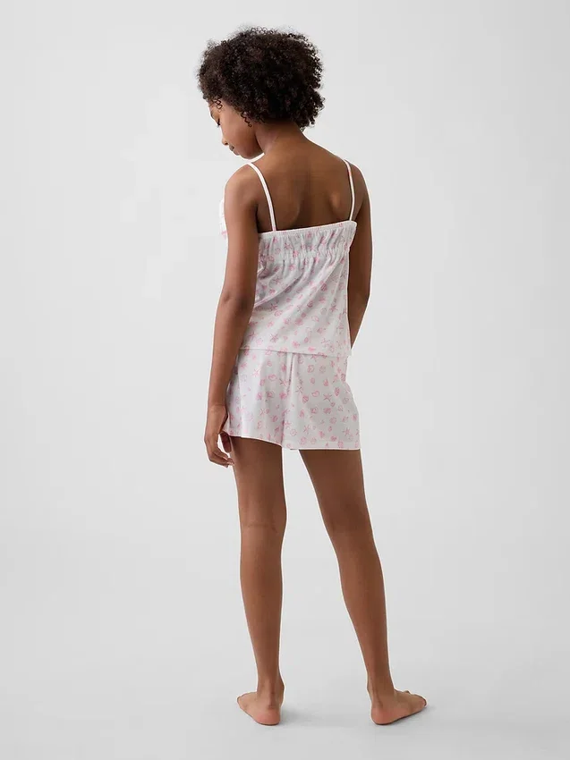 Pyjamas-set för barn i återvunnet material med volangtop och shorts
