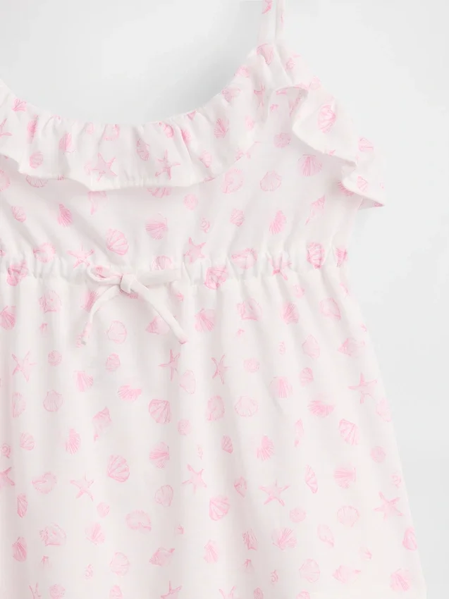 Pyjamas-set för barn i återvunnet material med volangtop och shorts