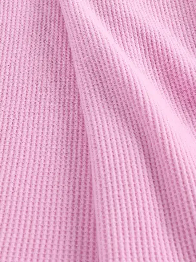 Pyjamaslinne i våffelstickning