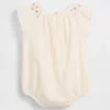 Smockad bodysuit med blommönster för spädbarn
