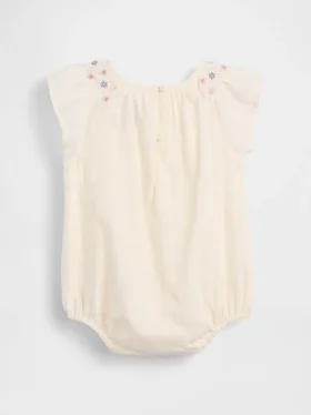 Smockad bodysuit med blommönster för spädbarn