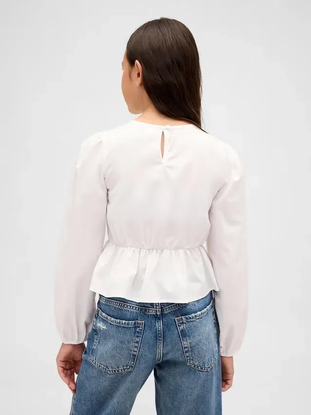 Smockad peplum-top för barn