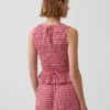 Smockad peplum-top i gingham
