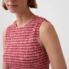 Smockad peplum-top i gingham