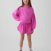 Snabbtorkande löparshorts med fjärilskant för barn