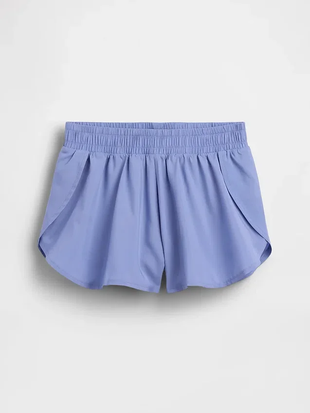 Snabbtorkande löparshorts med fjärilskant för barn