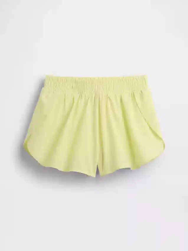 Snabbtorkande löparshorts med fjärilskant för barn