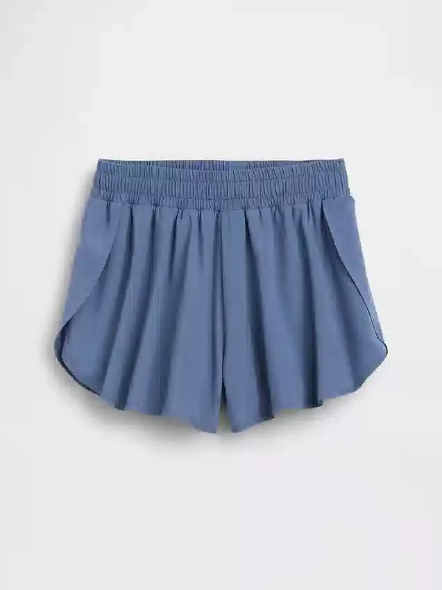 Snabbtorkande löparshorts med fjärilskant för barn