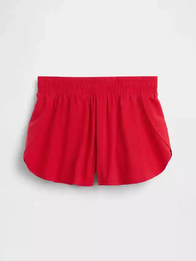 Snabbtorkande löparshorts med fjärilskant för barn