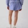 Snabbtorkande löparshorts med fjärilskant för barn