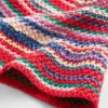 Strickad randig buckethat