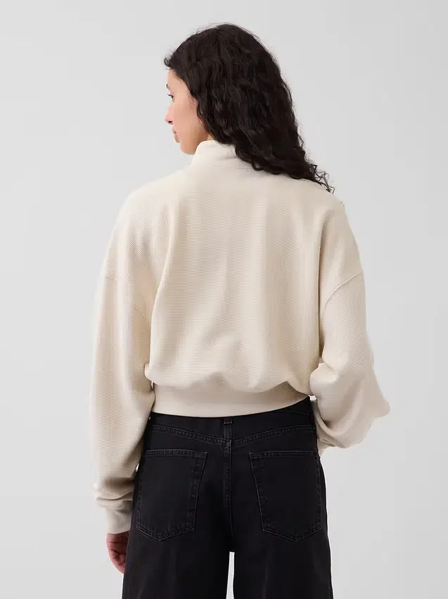 Strukturerad bomullströja i oversized-modell med halv dragkedja