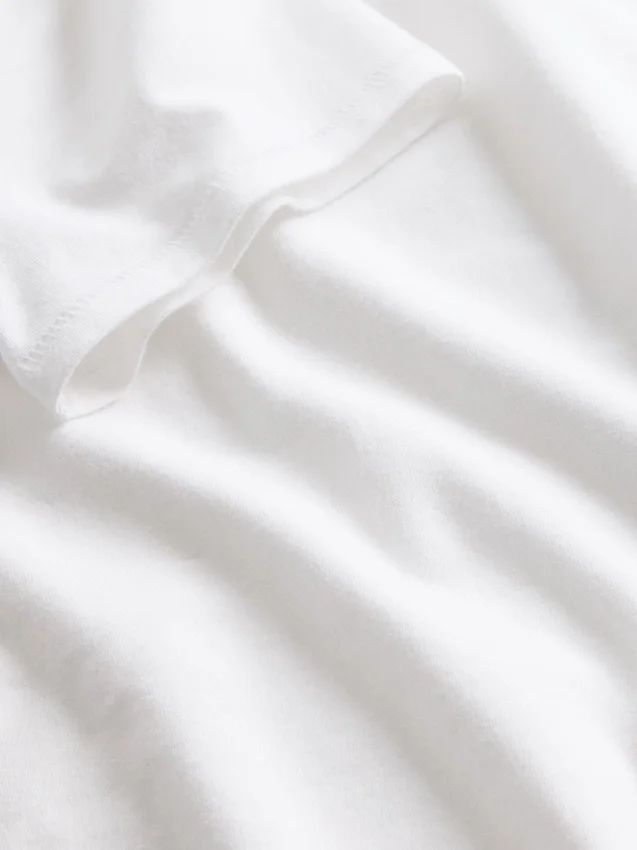 T-shirt-bodysuit i tättstickad jersey