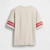 T-shirt för barn i tjockt tyg med oversized-passform och logotyp i sömmen