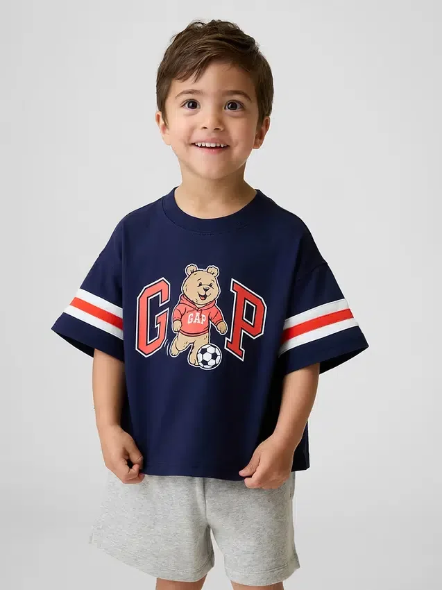 T-shirt i oversized-passform för Baby & Småbarn med Brannan Bear Varsity-grafik och logotyp