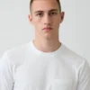 T-shirt med ficka i ekologisk bomull för vuxna