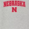 T-shirt med mörk grafisk bild av University of Nebraskas Arch Logo