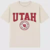 T-shirt med mörk grafisk bild av University of Utahs universitetsvapen