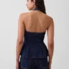 Tajt denimtop med halterneck och peplum