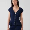 Tajt sittande peplum-top i denim med korta ärmar