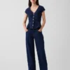 Tajt sittande peplum-top i denim med korta ärmar
