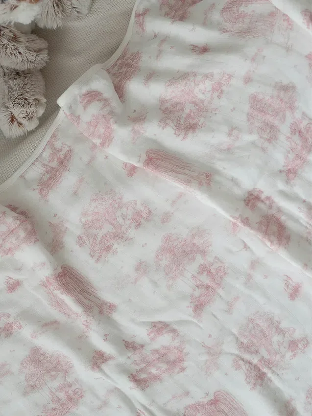 The Gilded Bird – Babyfilt i bambu med vårmönster
